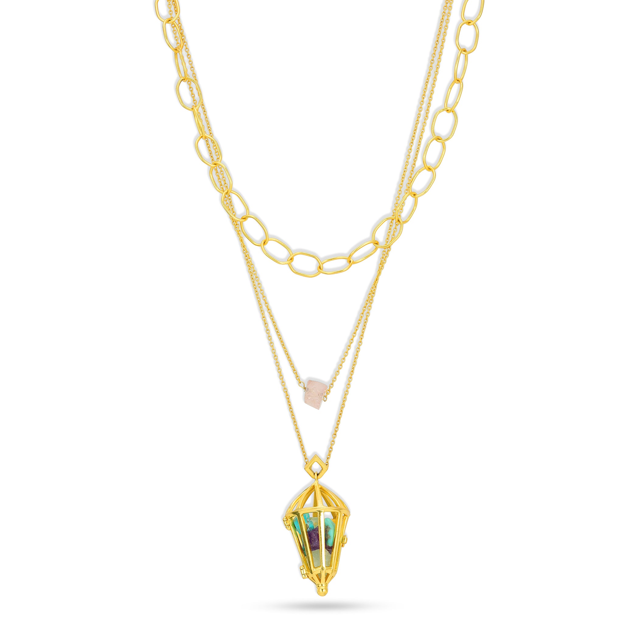 Gold necklace with a layered design on a white background