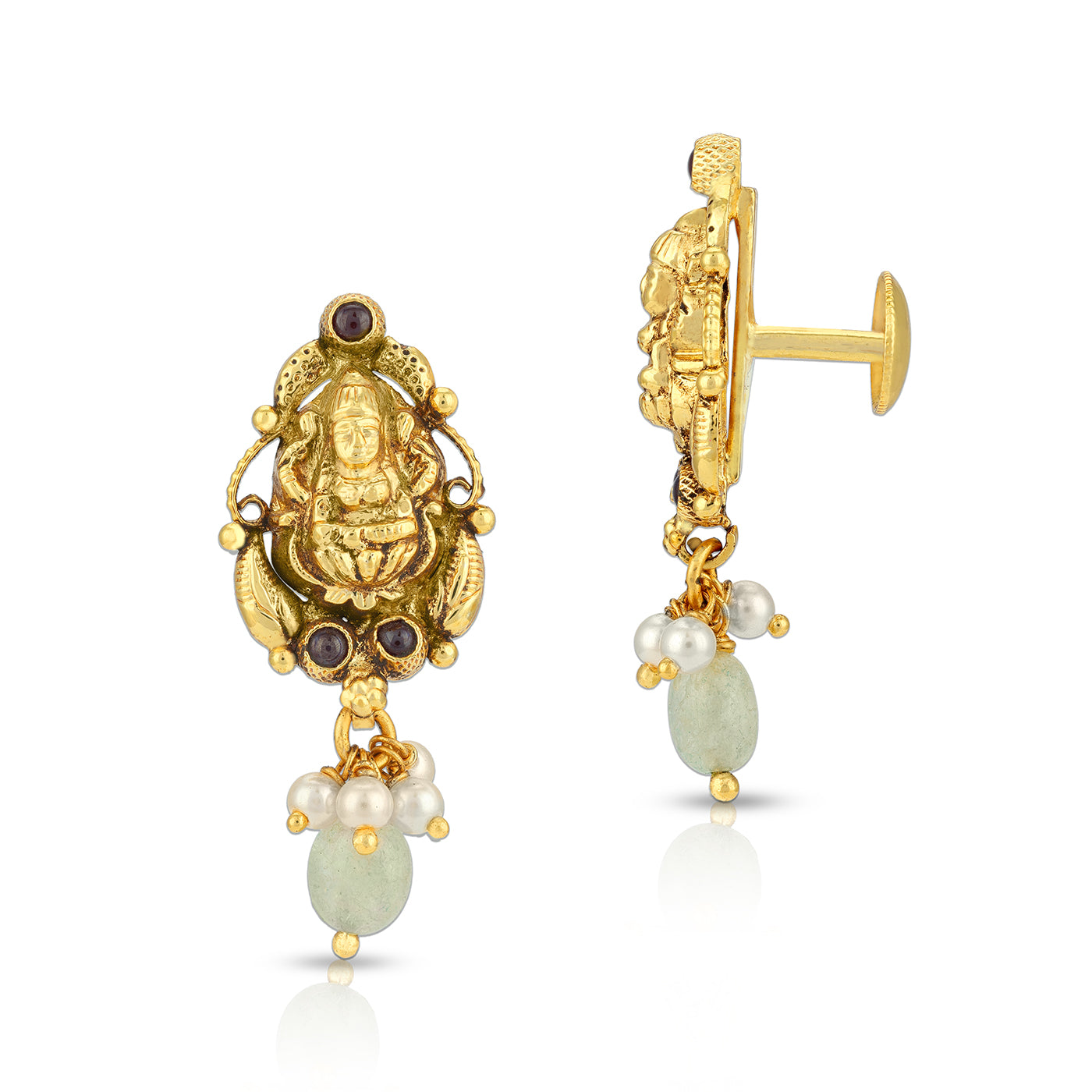 Gold earrings with gemstones and pearls on a white background