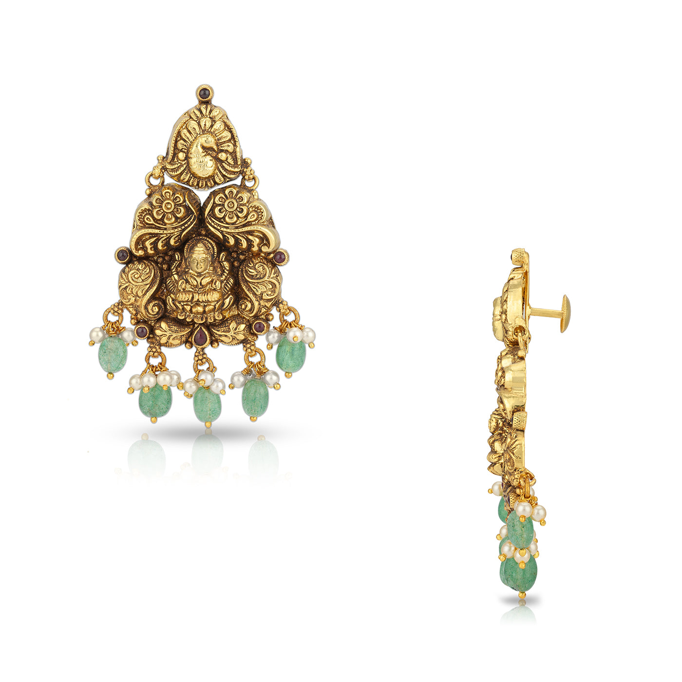 Gold and green gemstone earrings on a white background