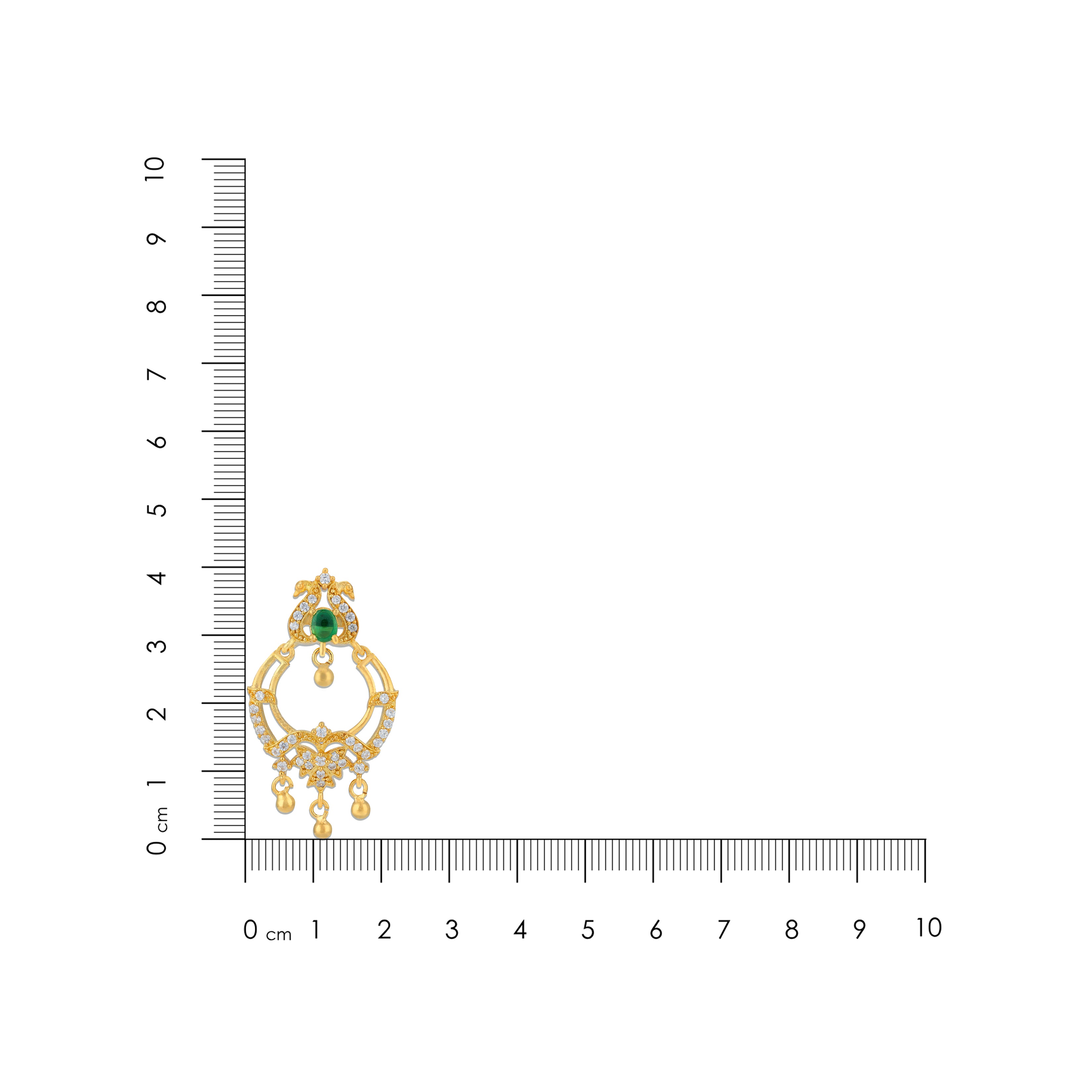 Gold earring with green gemstone next to a ruler on a white background