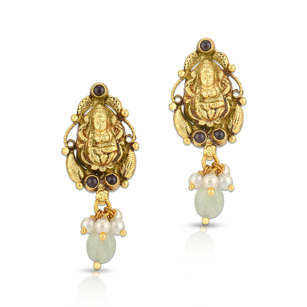 Gold earrings with religious figure design on a white background