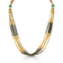 Gold necklace with black beads and colorful accents on a white background