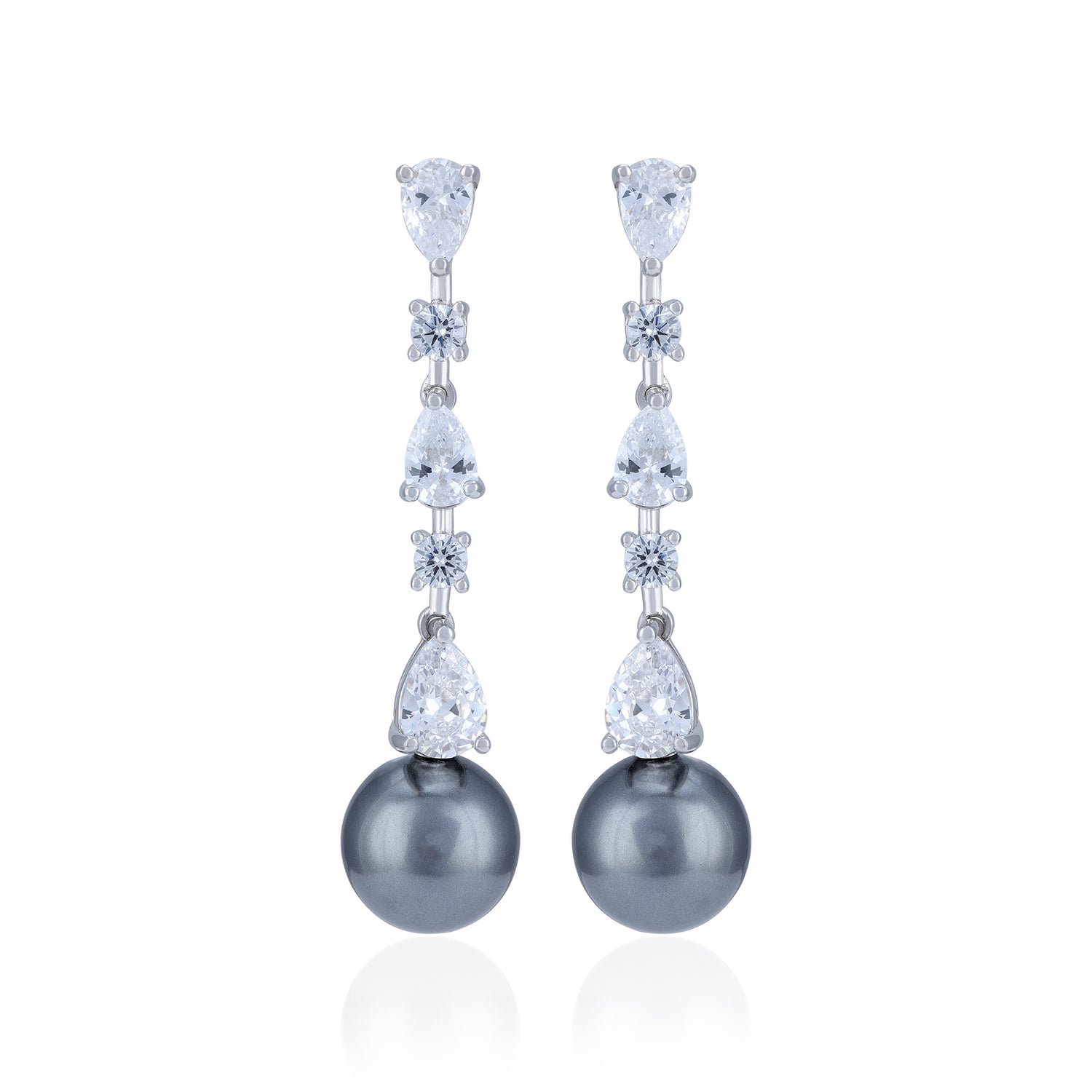 Elegant earrings with pearls and crystals on a white background