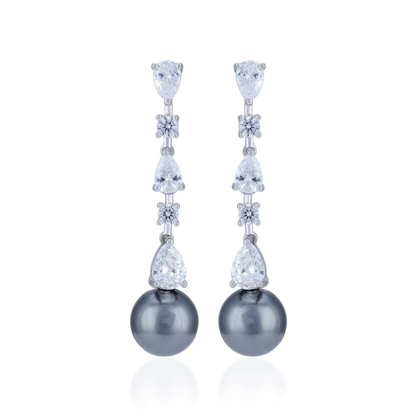 Elegant earrings with pearls and crystals on a white background