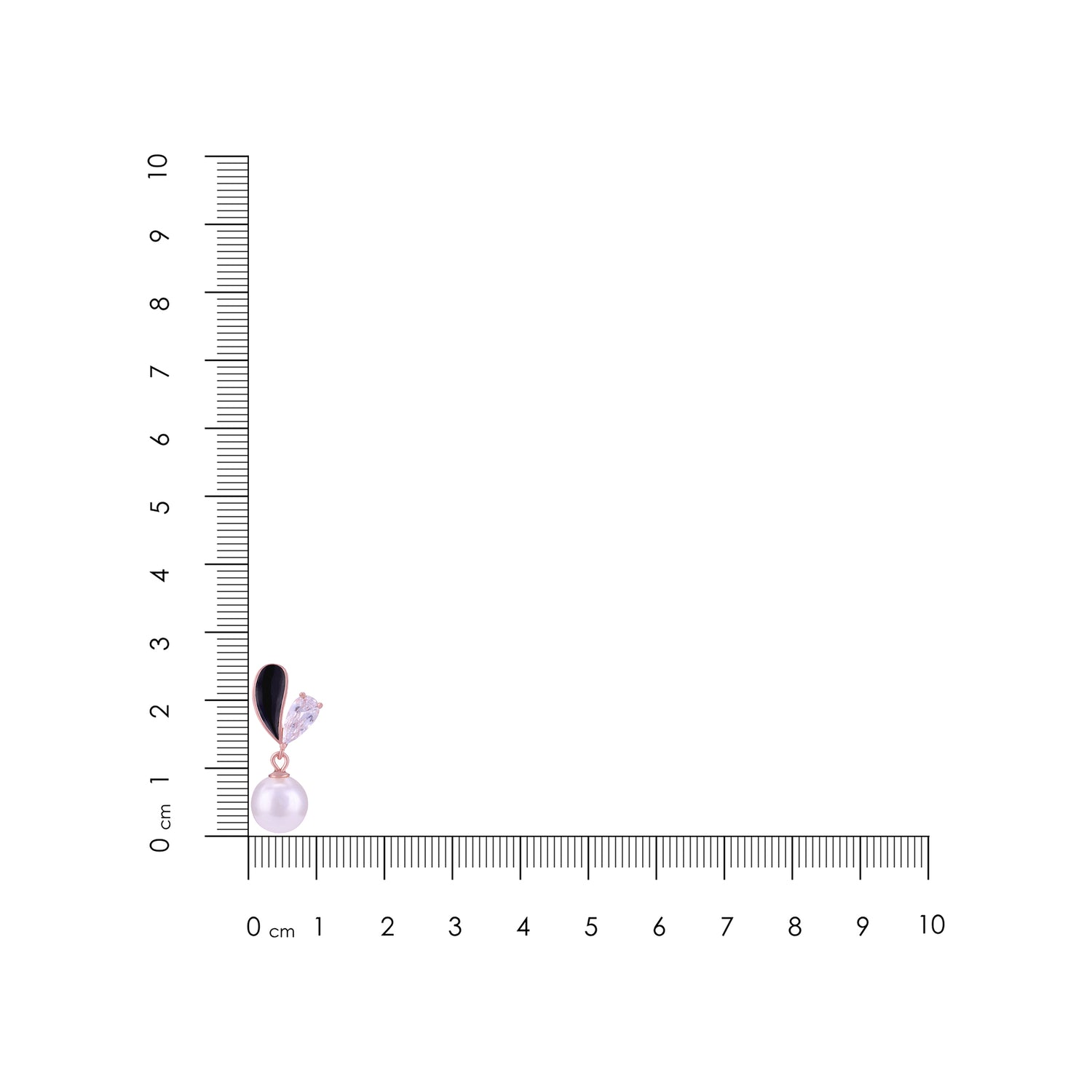 Dangle earrings with a pearl and gemstone on a ruler for scale