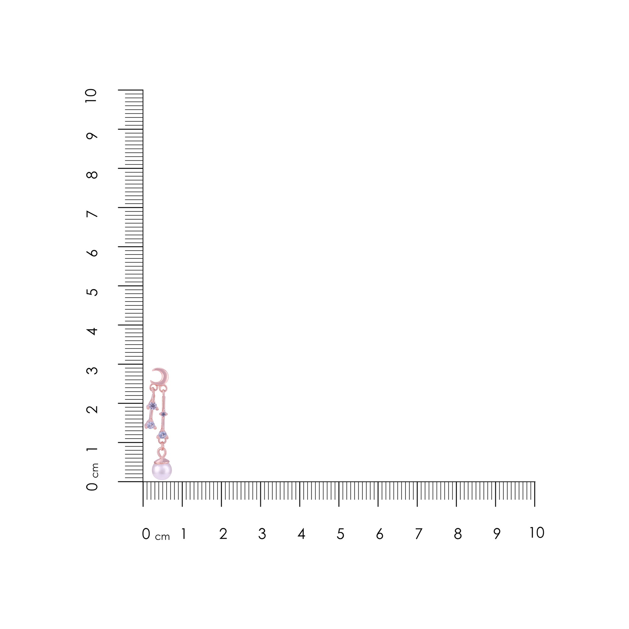 Small pink flower arrangement next to a ruler for scale on a white background