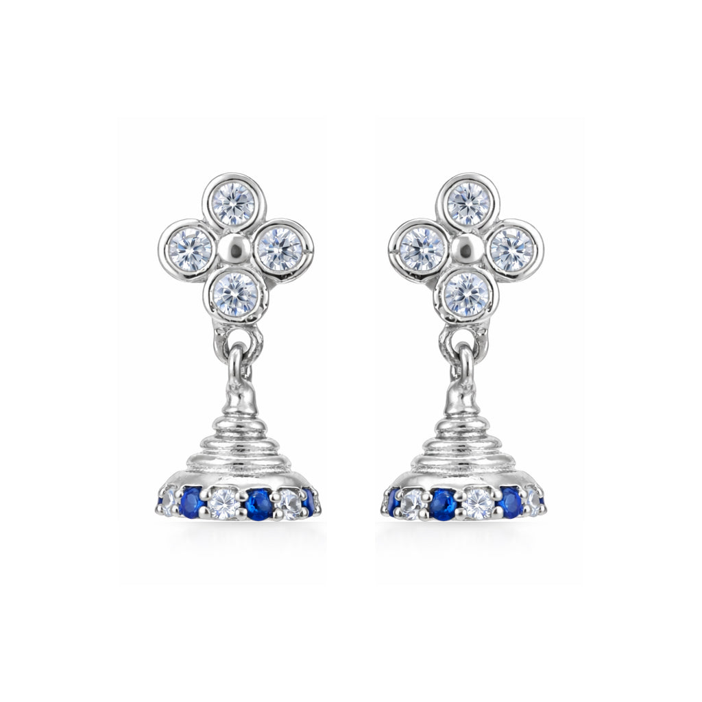 Pair of silver flower-shaped earrings with blue stones on a white background