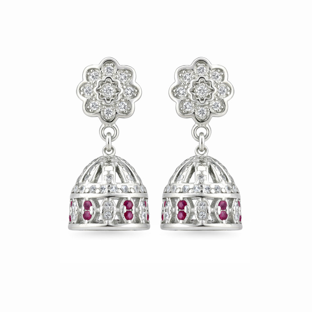 Silver earrings with floral top and bell-shaped bottom on a white background