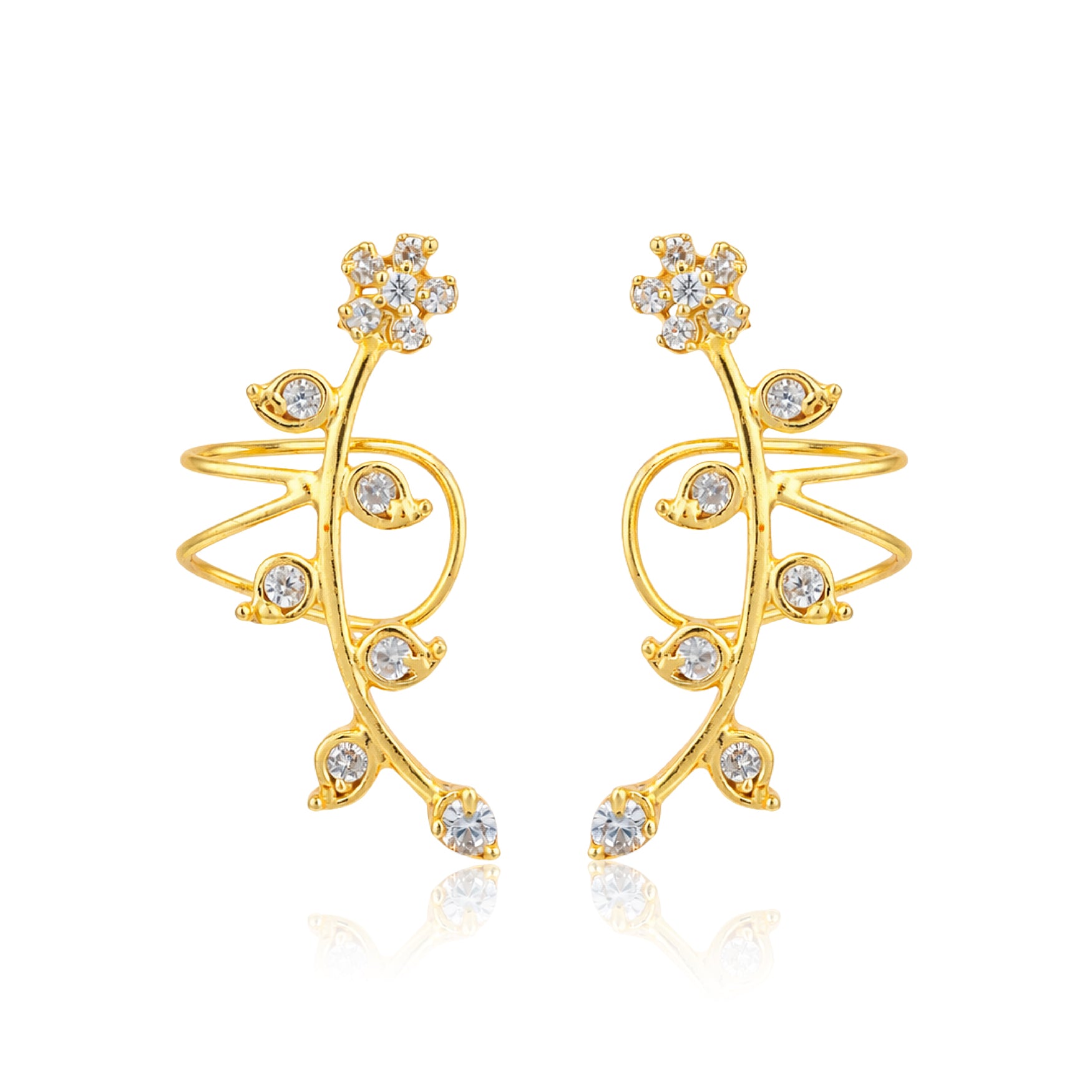 Gold earrings with diamond-like stones on a white background