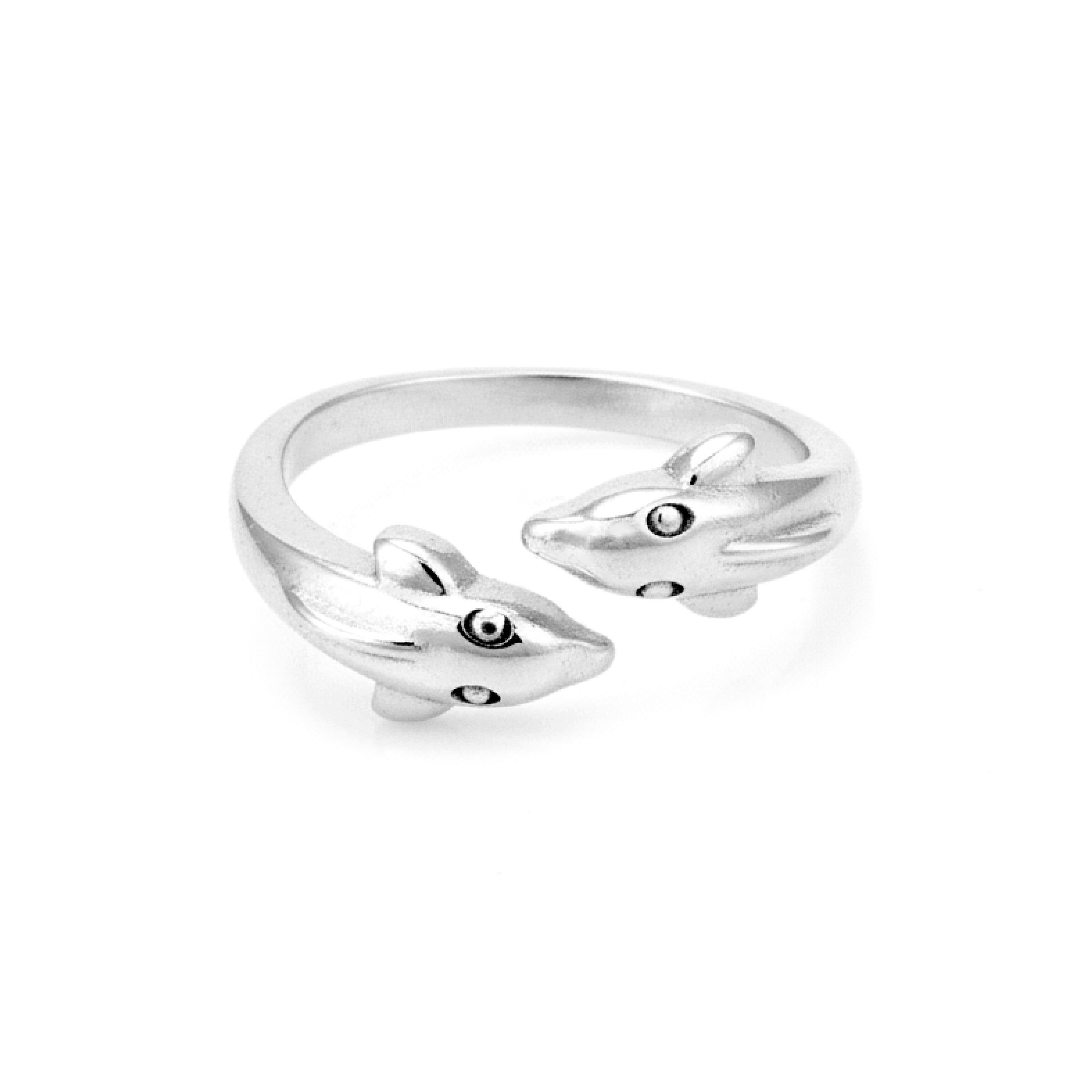 Silver ring with fox designs on a white background
