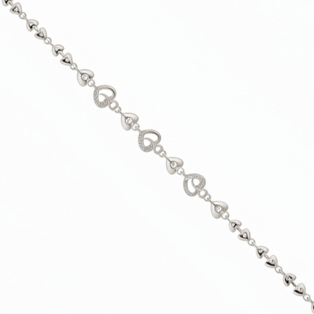 Silver bracelet with heart-shaped links on a white background