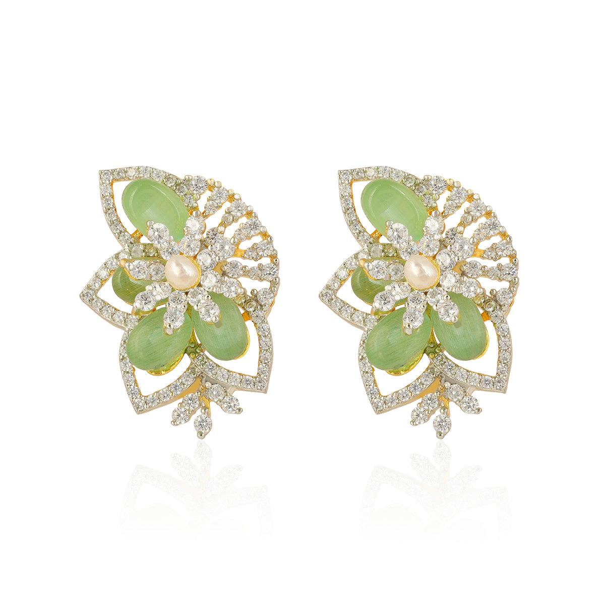 Pair of earrings with green gemstones and gold accents on a white background