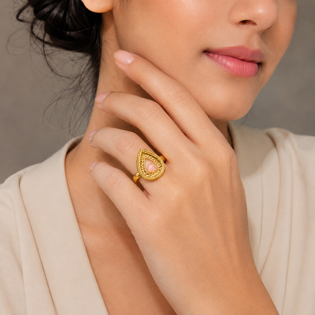 Luminous Teardrop Crest Pink Gem Golden Designer Ring