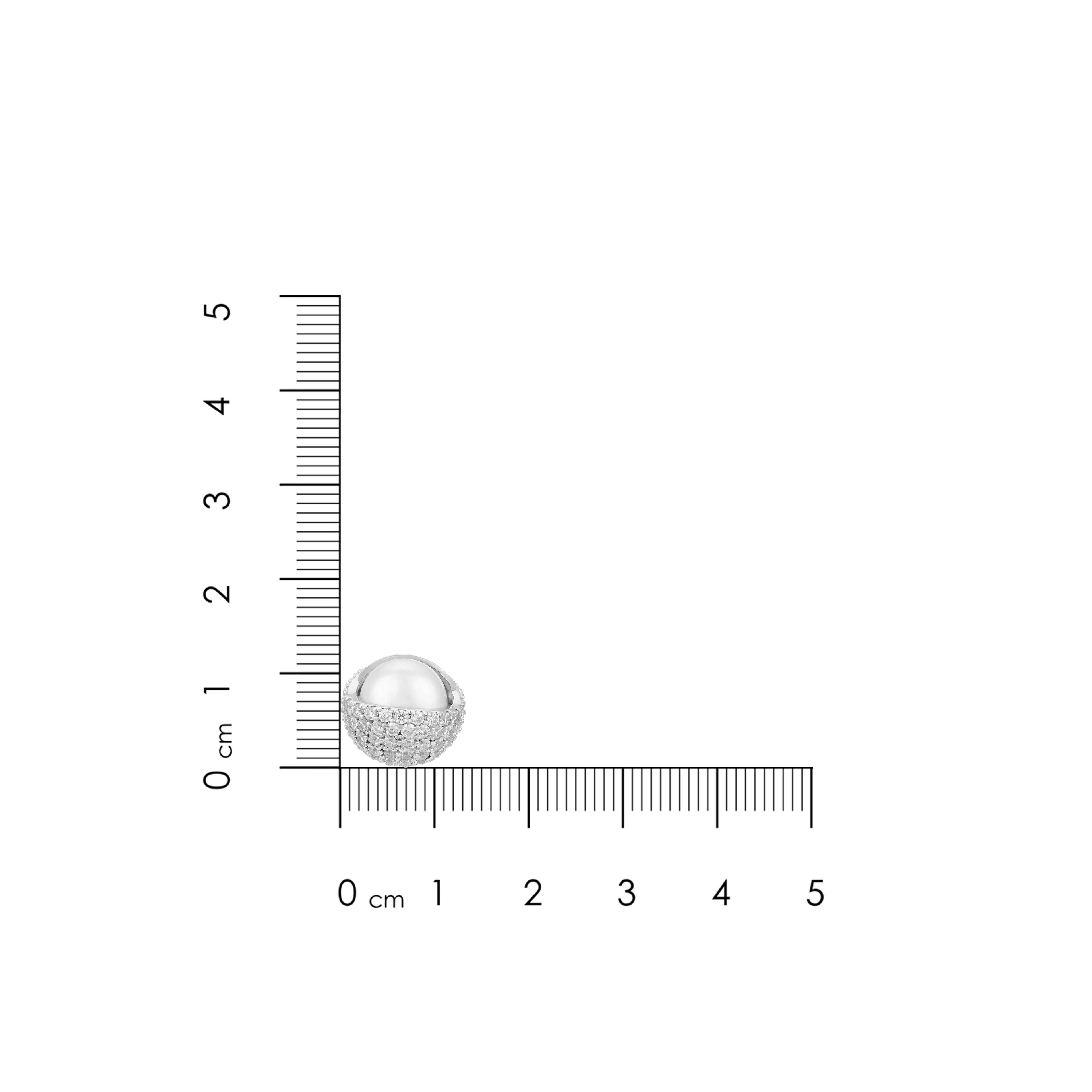 Silver ring with a textured design on a white background with a ruler for scale.