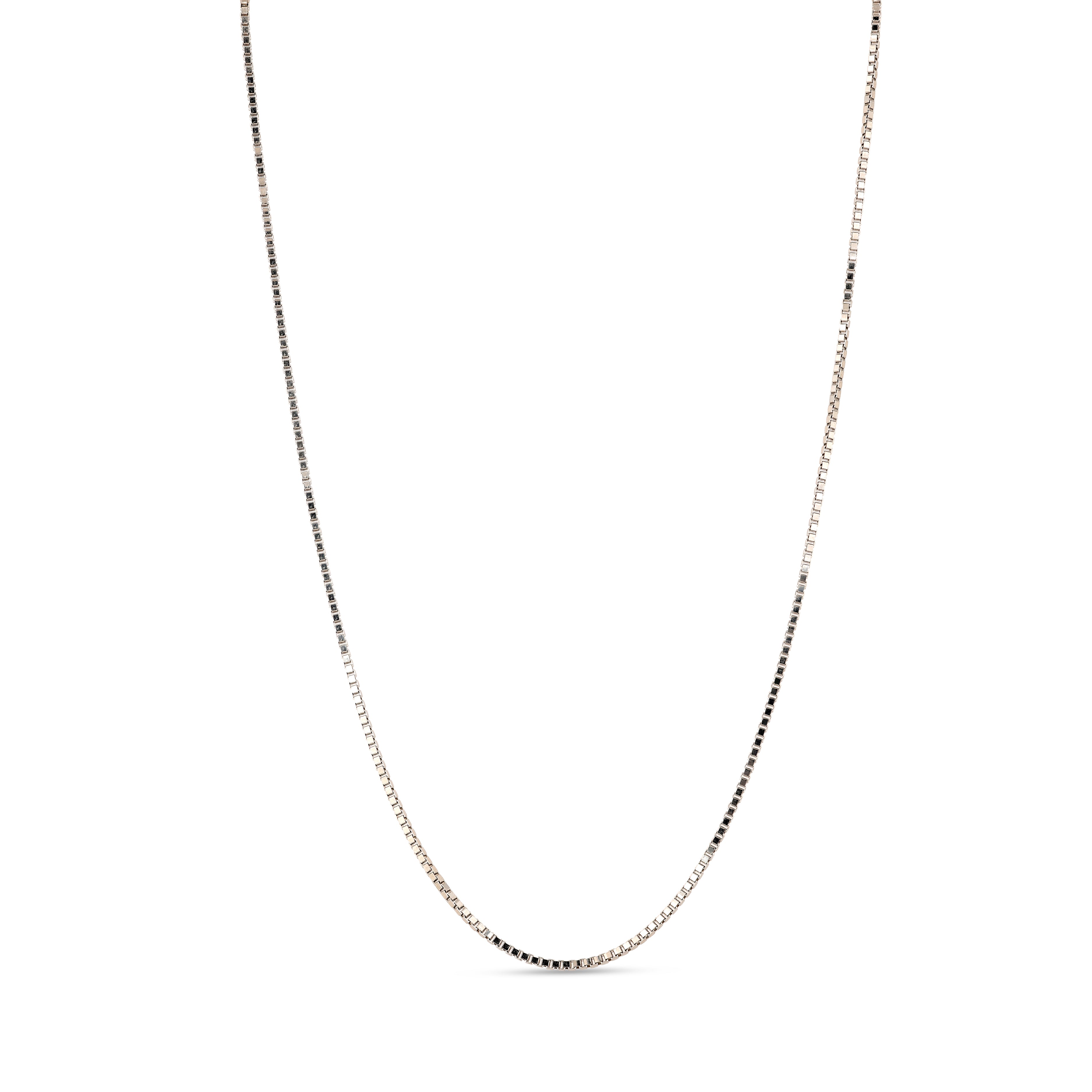 Silver chain necklace on a white background