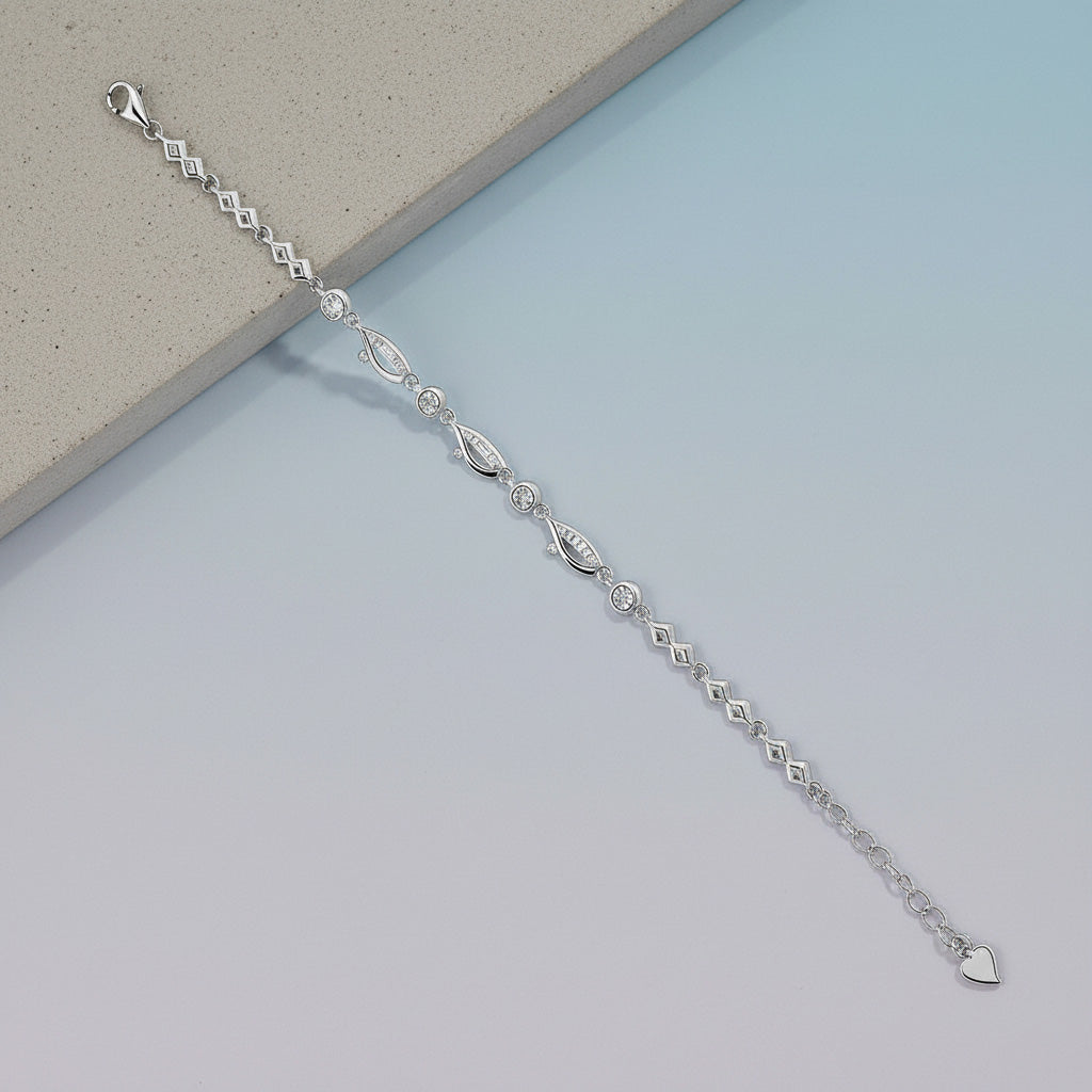 Silver bracelet on a light blue surface