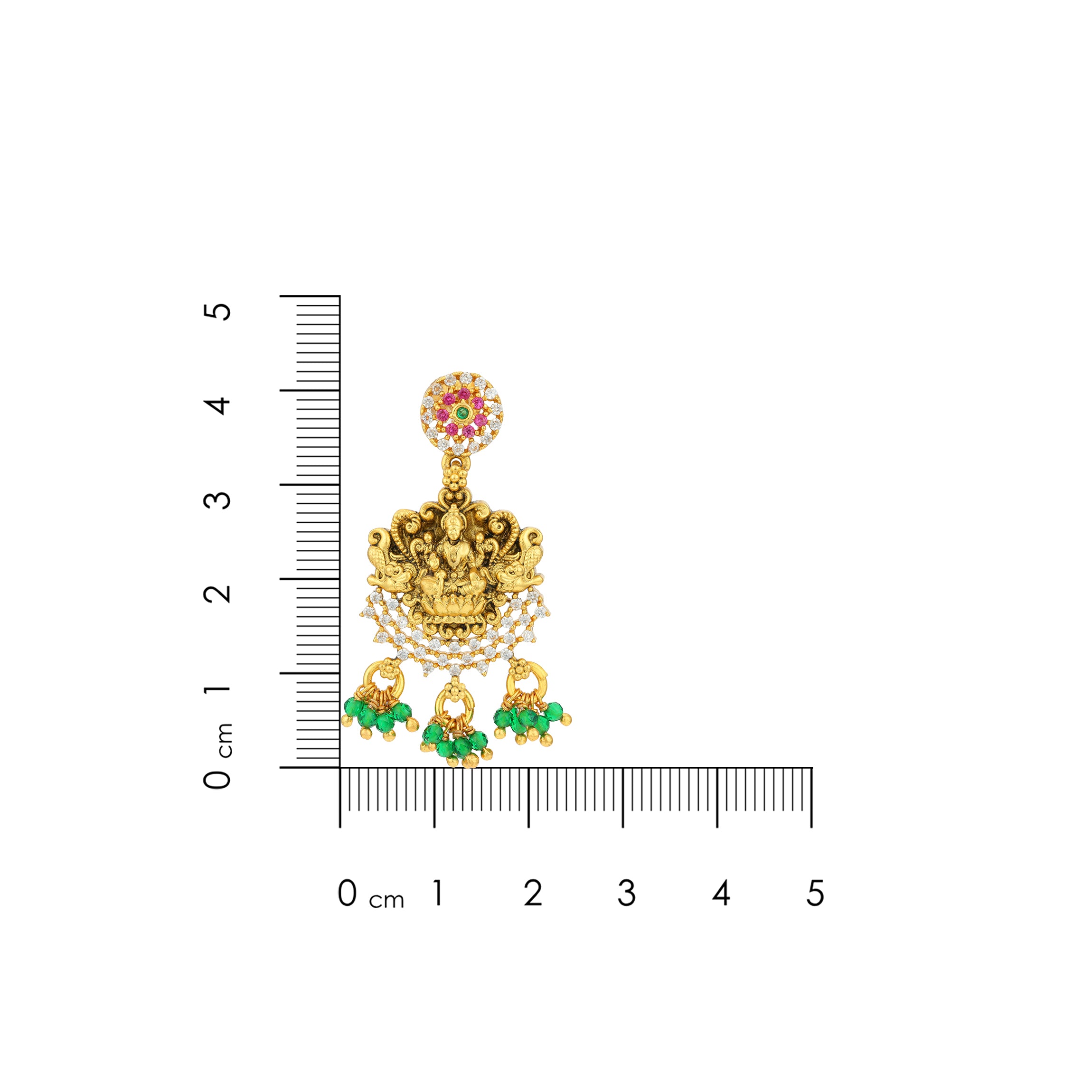 Gold earrings with green gemstones and a ruler for scale on a white background