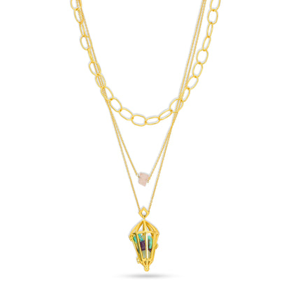 Gold necklace with a layered design on a white background