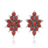 Pair of red floral earrings with silver accents on a white background