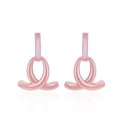 Pair of pink hoop earrings on a white background