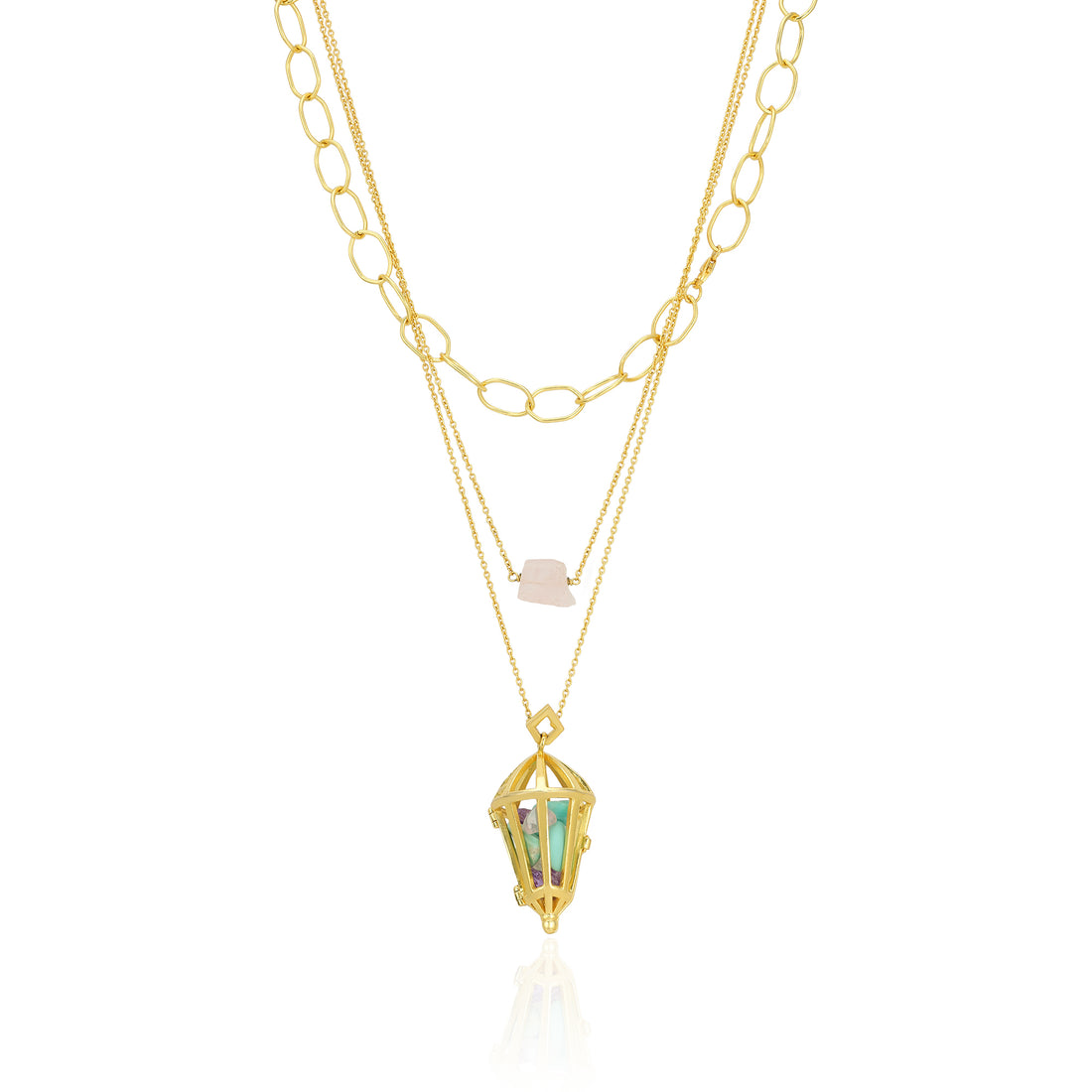 Gold necklace with a pendant on a white background