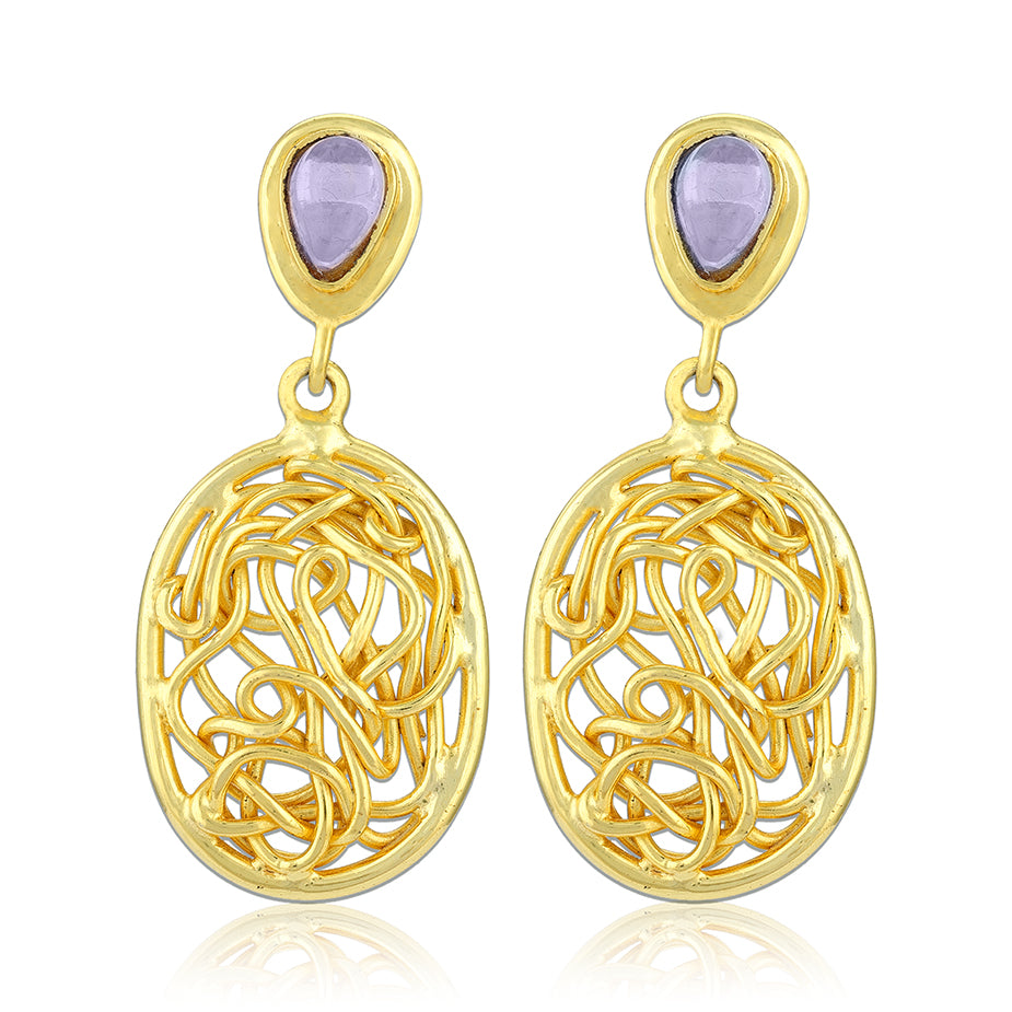 Gold earrings with purple gemstones on a white background