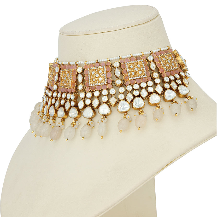 Gold-plated 925 silver choker featuring pink pearls and Polki stones for festive and traditional wear.