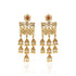 Gold earrings with red gemstones on a white background