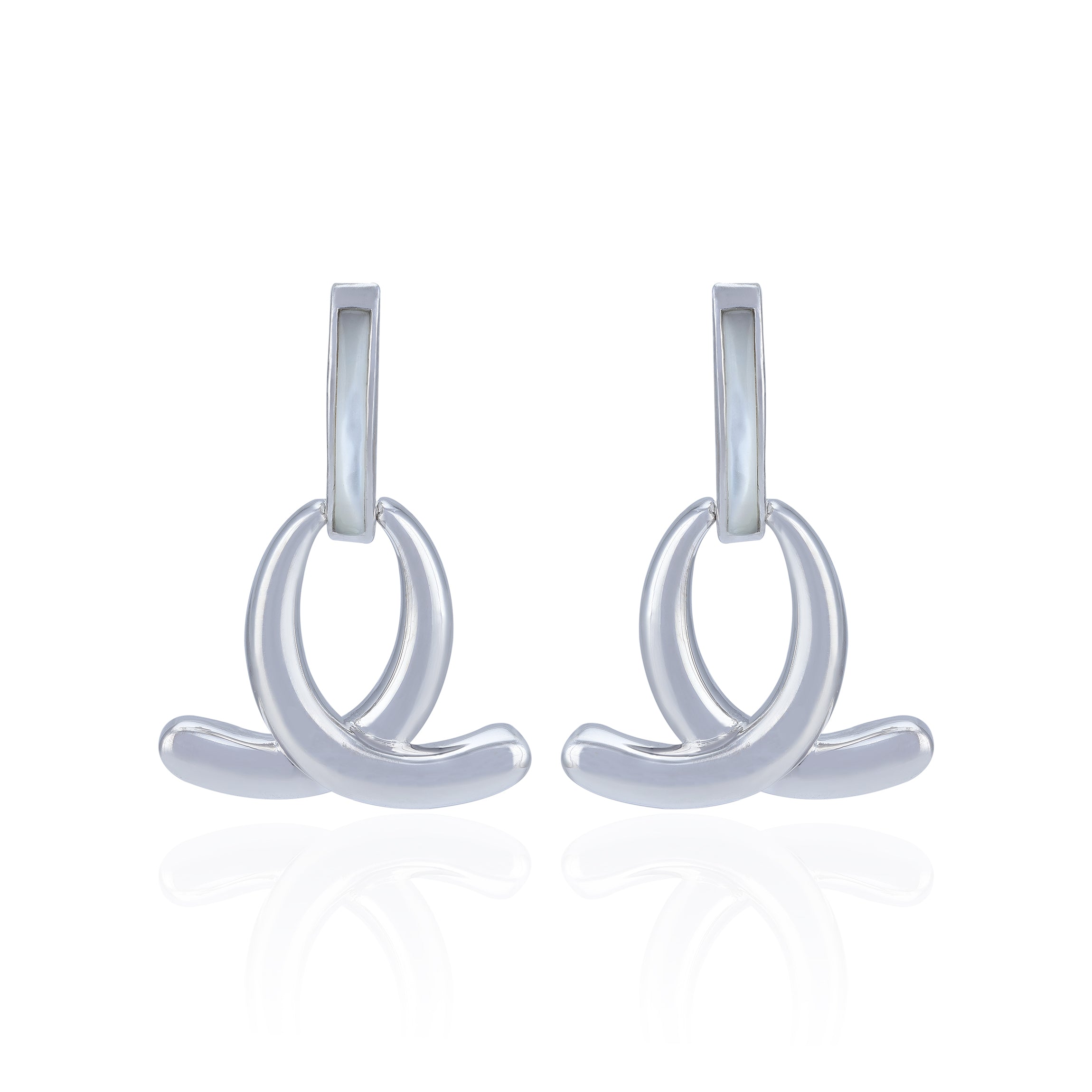 Pair of silver earrings on a white background