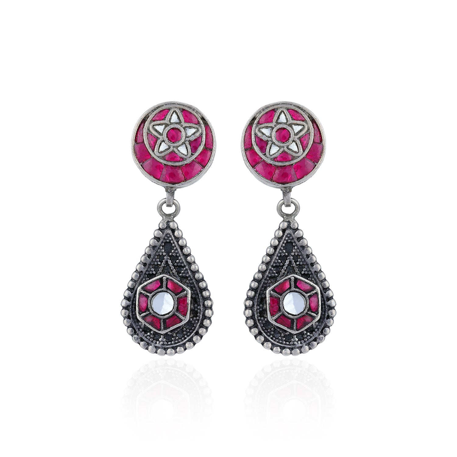 Pair of earrings with pink and silver designs on a white background