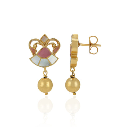 Gold earrings with a decorative top piece and spherical bottom on a white background