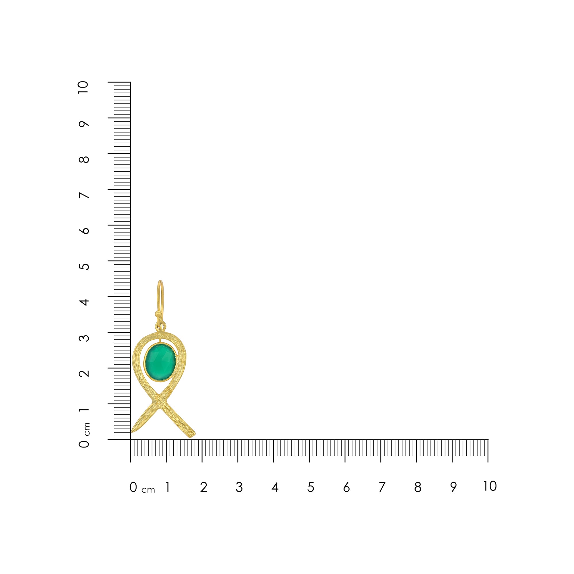 Gold pendant with green gemstone on a ruler for scale