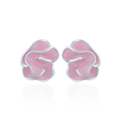 Pink floral earrings on a white background