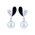 Pair of earrings with black and white gemstones