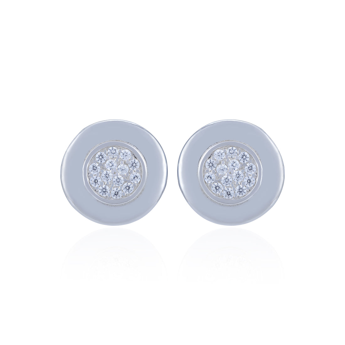 Pair of round earrings with gemstone centers on a white background