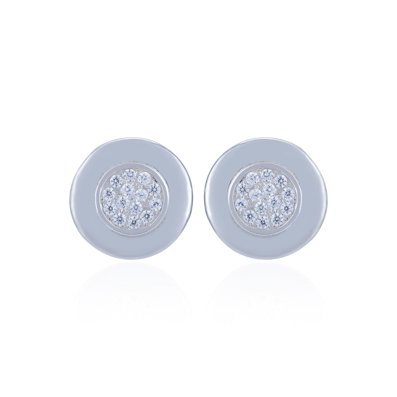 Pair of round earrings with gemstone centers on a white background