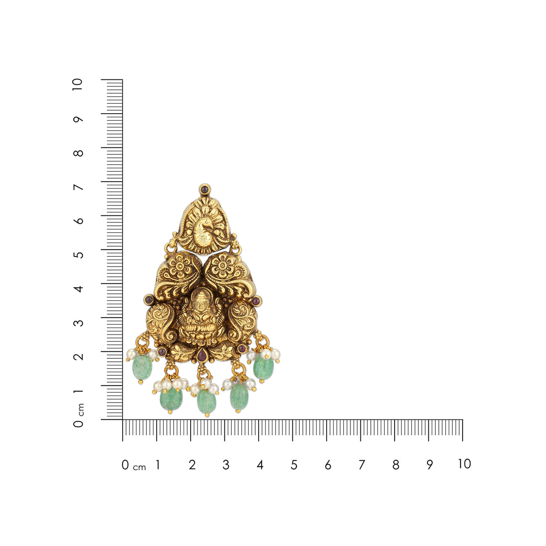 Gold and green gemstone pendant with a ruler for scale on a white background