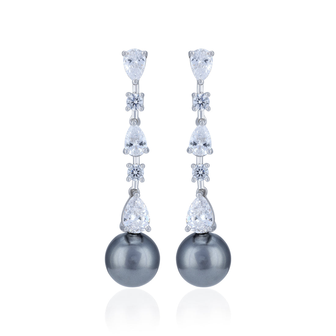 Elegant earrings with pearls and crystals on a white background