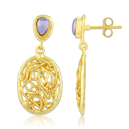 Gold earrings with purple gemstones on a white background