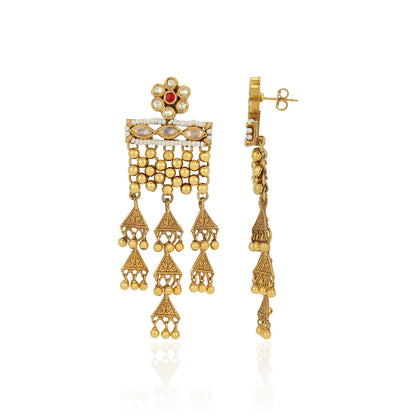 Gold earrings with intricate designs on a white background
