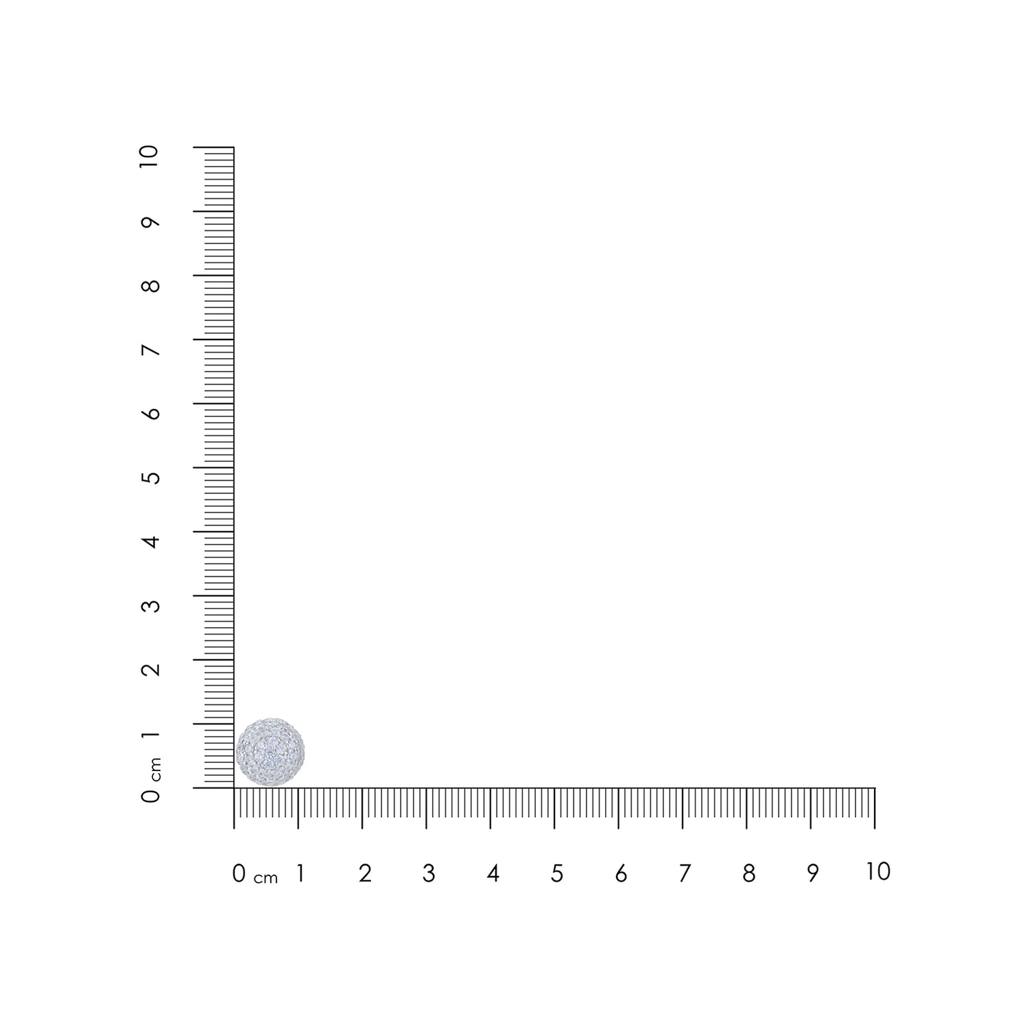 Small round object next to a ruler on a white background