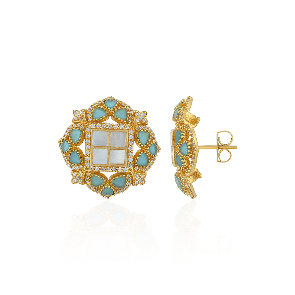 Gold and turquoise earrings on a white background