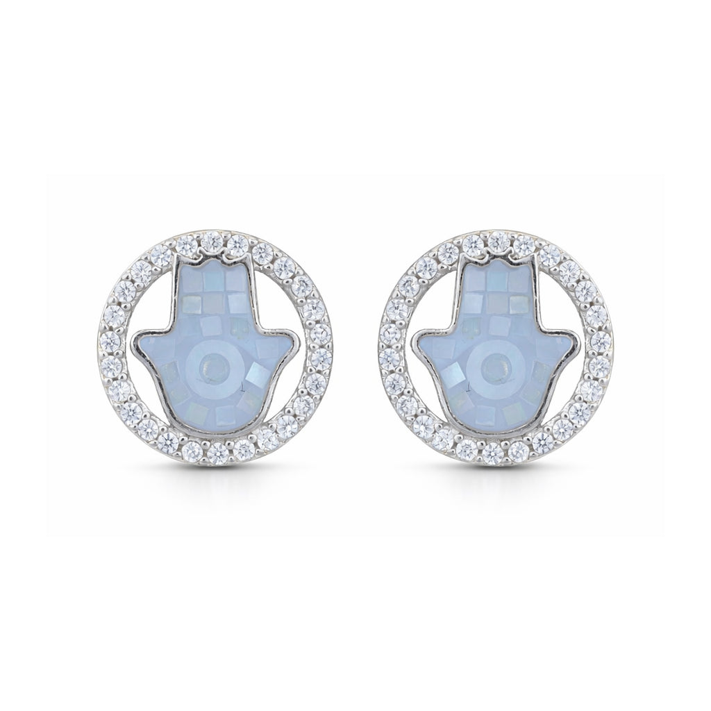 Pair of earrings with Hamsa design on a white background