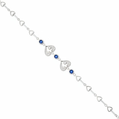 Silver bracelet with heart-shaped links and blue gemstones on a white background