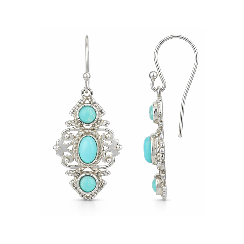 Silver earrings with turquoise stones on a white background