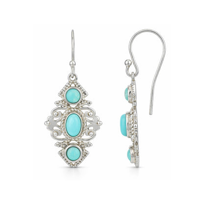 Silver earrings with turquoise stones on a white background
