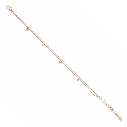 Rose gold bracelet on a white background