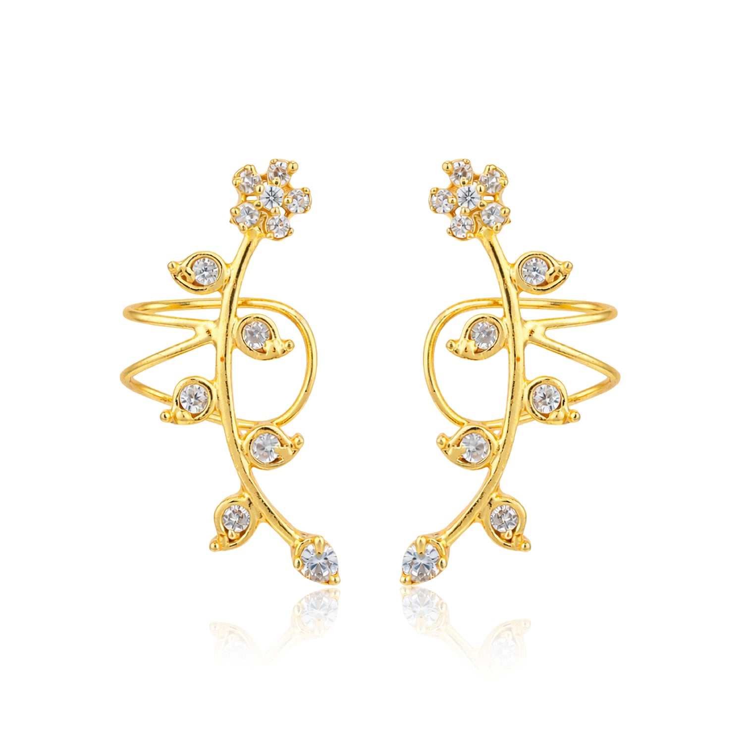 Gold earrings with diamond-like stones on a white background