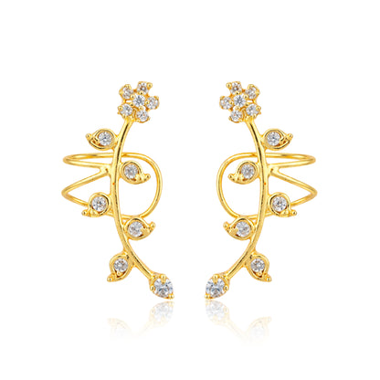 Gold earrings with diamond-like stones on a white background