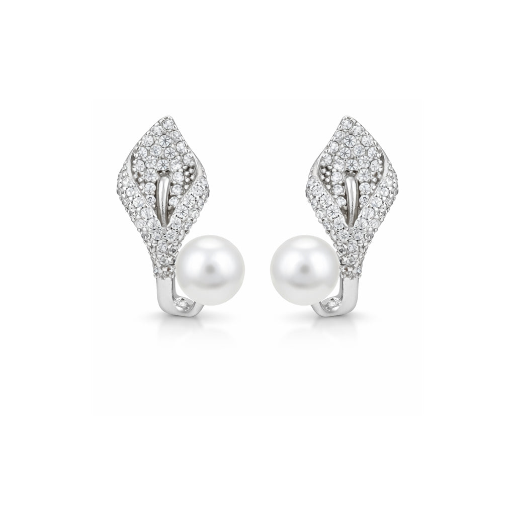 Pair of silver earrings with pearls on a white background